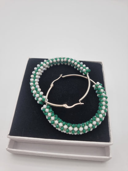 Orecchio con perline di cristallo